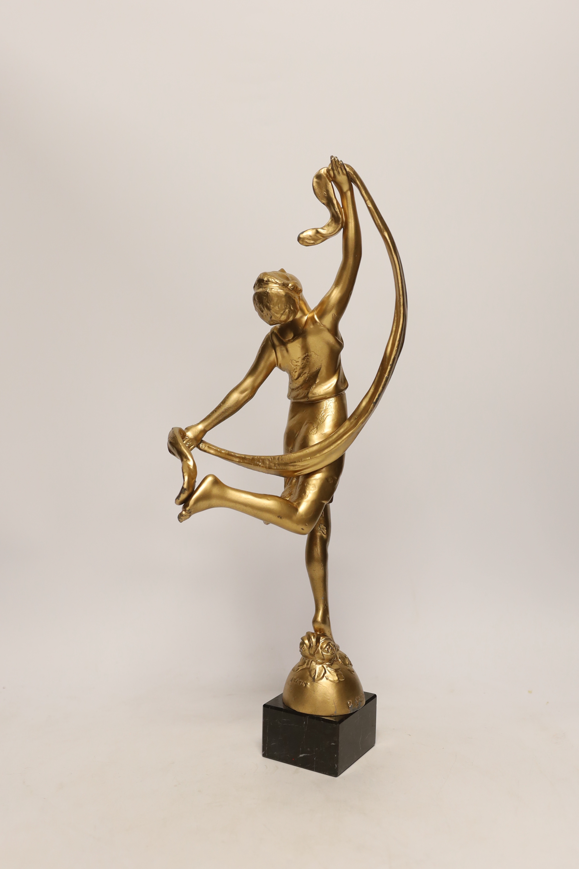 P. Sega, a gold painted figure of a lady on a marble base, 44cm